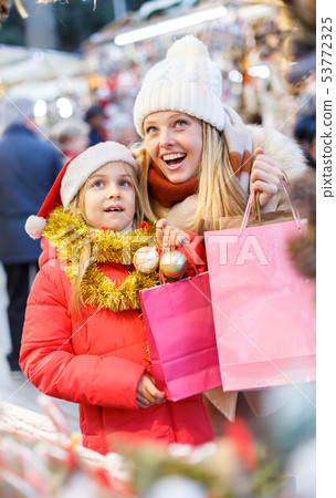 Family shopping on Christmas market Family shopping on Christmas market 53772325
