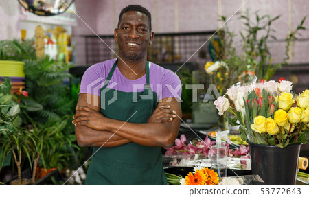Proud florist in floral shop Proud florist in floral shop 53772643