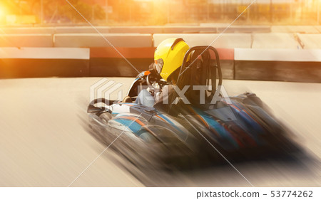 Portrait of nice female driving car at outdoors Portrait of nice female driving car at outdoors 53774262