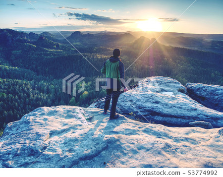 Photographer traveler thinking and set  tripod for 53774992