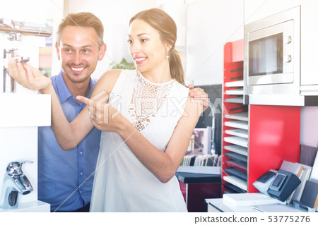 Adult family is choosing new mixer tap 53775276