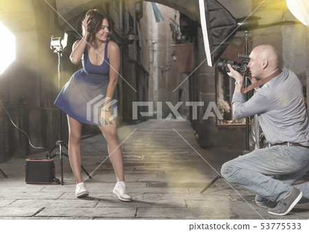 woman posing for professional photographer 53775533