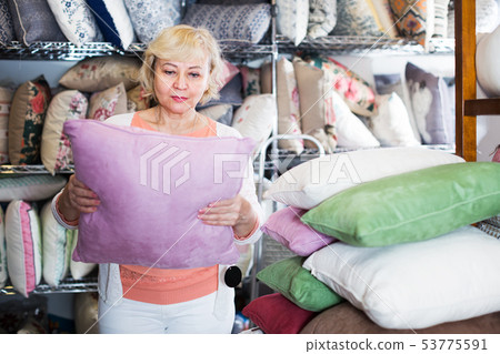 mature housewife buying pillow mature housewife buying pillow 53775591