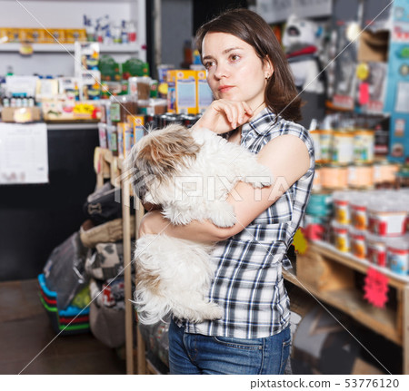 female with dog selecting vet preserves female with dog selecting vet preserves 53776120