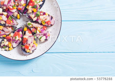 Traditional Peruvian food background with mussels Traditional Peruvian food background with mussels 53776288