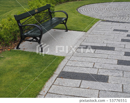 Park bench after the rain 53776551