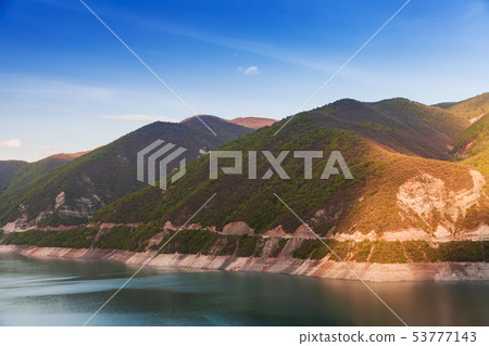 Zhinvali reservoir in evening sun Zhinvali reservoir in evening sun 53777143