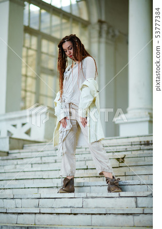 dreadlocks fashionable girl dressed in white 53777384
