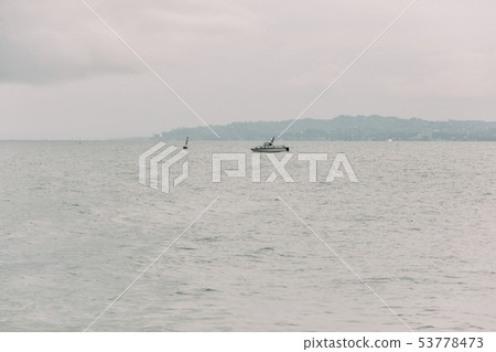 yacht in the Black Sea on cloudy day 53778473