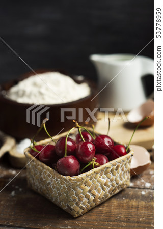 ingredients for a coca de cireres, a cherry cake 53778959