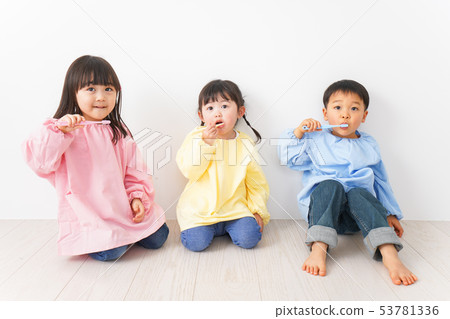 Children brushing their teeth Children brushing their teeth 53781336