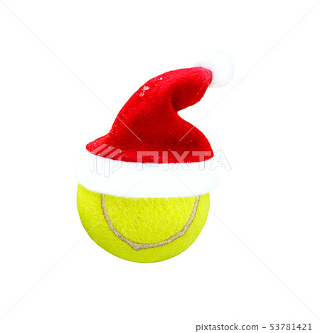 Santa hat on tennis ball on white background. Merry Christmas and Happy New year concept with tennis 53781421