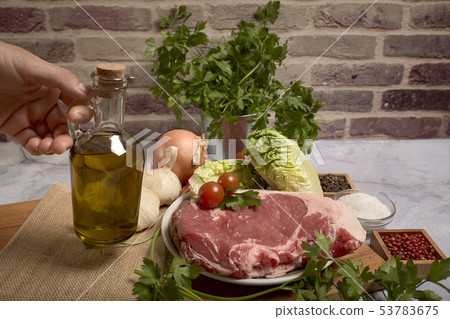 red veal chop on a plate red veal chop on a plate 53783675