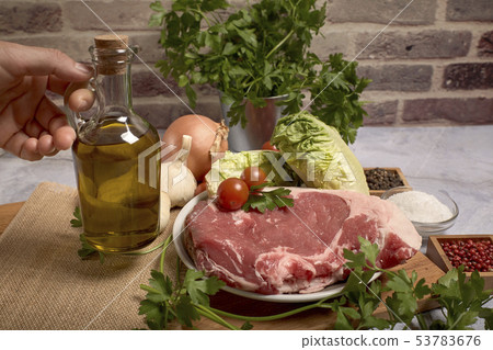 red veal chop on a plate red veal chop on a plate 53783676