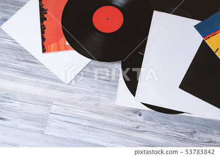 Black vinyl record on background Black vinyl record on background 53783842