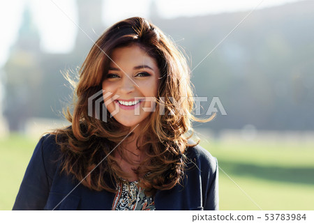 Fashionable woman posing outdoor Fashionable woman posing outdoor 53783984