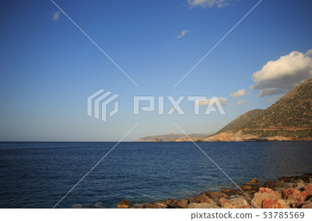 Blue Mediterranean Sea and the mountains in the background Blue Mediterranean Sea and the mountains in the background 53785569