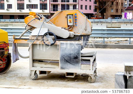 Machine for cutting paving slabs on a street 53786783