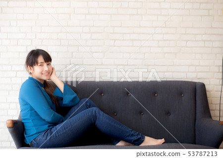 Beautiful portrait young asian woman sitting Beautiful portrait young asian woman sitting 53787213