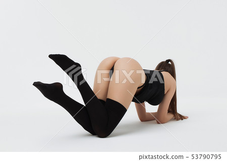 Beautiful sexy slim woman on white background 53790795