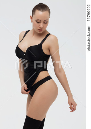 Beautiful sexy slim woman on white background Beautiful sexy slim woman on white background 53790902