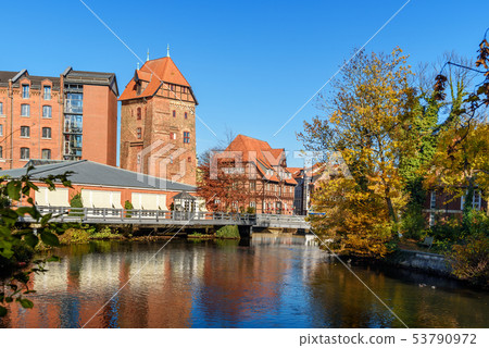 Old historic harbor of Ilmenau river in Luneburg. Old historic harbor of Ilmenau river in Luneburg. 53790972