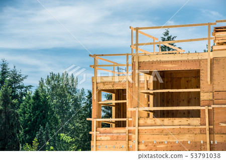 Top of new residential building under construction. Top of new residential building under construction. 53791038