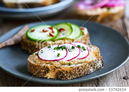 Radishes and Hummus Bruschetta 53792634