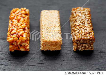 Cereal granola bar with peanuts, sesame and 53794911
