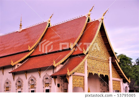 Main temple image of Thai Buddhist temple dyed at dusk (Thailand) Main temple image of Thai Buddhist temple dyed at dusk (Thailand) 53795005