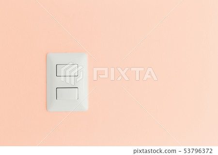 Switch light panel on white wall interior 53796372