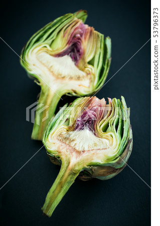Fresh raw half cut artichokes 53796373