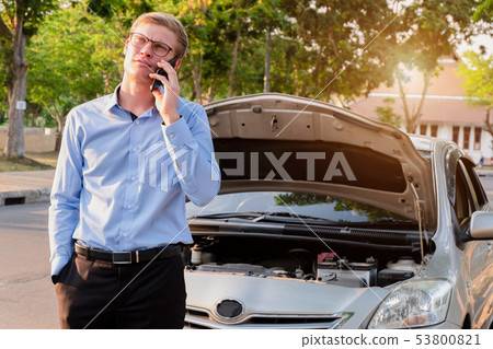 business man calling insurance agent after business man calling insurance agent after 53800821