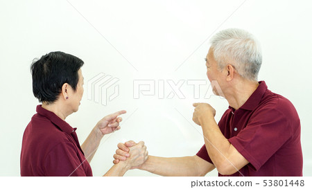 Asian senior couple checking on information 53801448