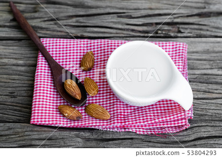 Almond milk and almonds Almond milk and almonds 53804293