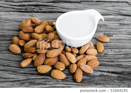 Almond milk and almonds Almond milk and almonds 53804295