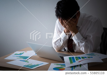 Businessman overtime 53805110
