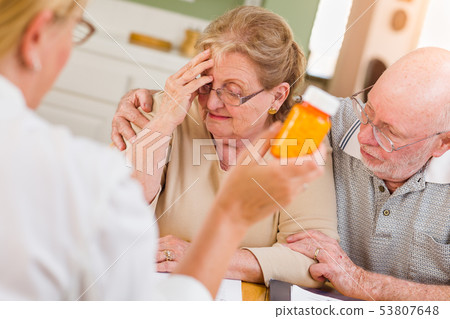 Doctor or Nurse Explaining Prescription Medicine 53807648