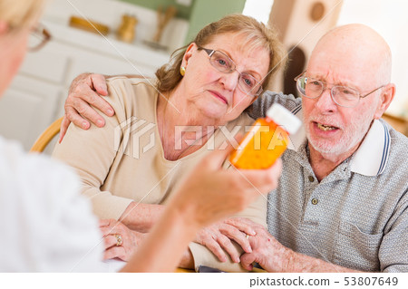 Doctor or Nurse Explaining Prescription Medicine 53807649