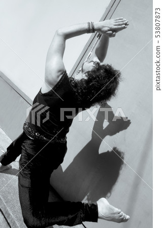 Bollywood dancer with beard and black curly hair Bollywood dancer with beard and black curly hair 53807873
