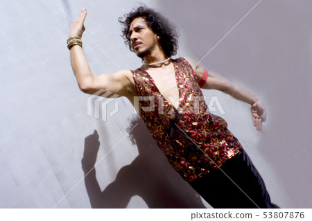 Bollywood dancer with beard and black curly hair Bollywood dancer with beard and black curly hair 53807876