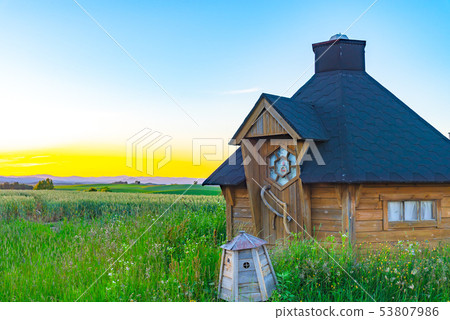Hut countryside sunset landscape fairy tale image Hut countryside sunset landscape fairy tale image 53807986