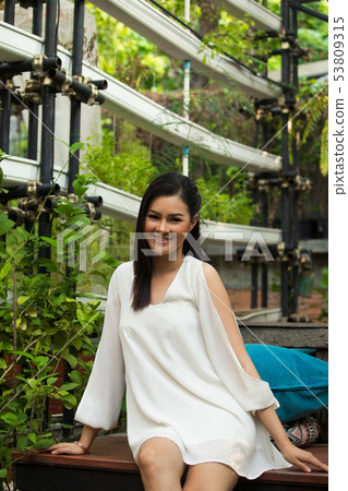 woman walk in Herb garden which is raw material woman walk in Herb garden which is raw material 53809315