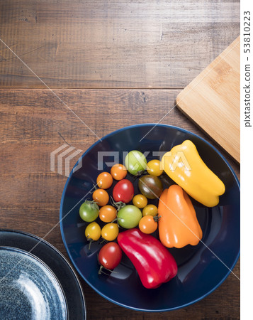 Colored cherry tomatoes and colored sweet peppers 53810223