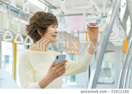 Senior woman Train Travel photography cooperation: Keio Electric Railway Co., Ltd. Senior woman Train Travel photography cooperation: Keio Electric Railway Co., Ltd. 53812288