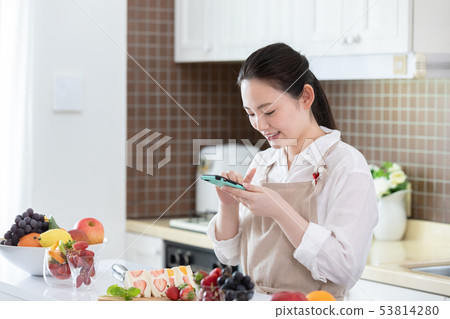 Female fruit sandwich 53814280
