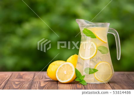 lemonade in glass jug 53814486