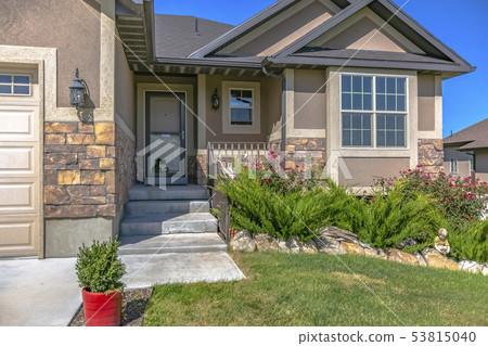 Entrance of home against blue sky on a sunny day 53815040