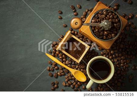 Coffee cup and coffee equipment on cement floor. Coffee cup and coffee equipment on cement floor. 53815516