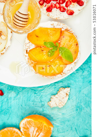 Rice Crisp bread healthy snack with tropical fruit Rice Crisp bread healthy snack with tropical fruit 53816071